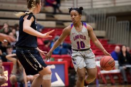Jade Everage competes in women's basketball