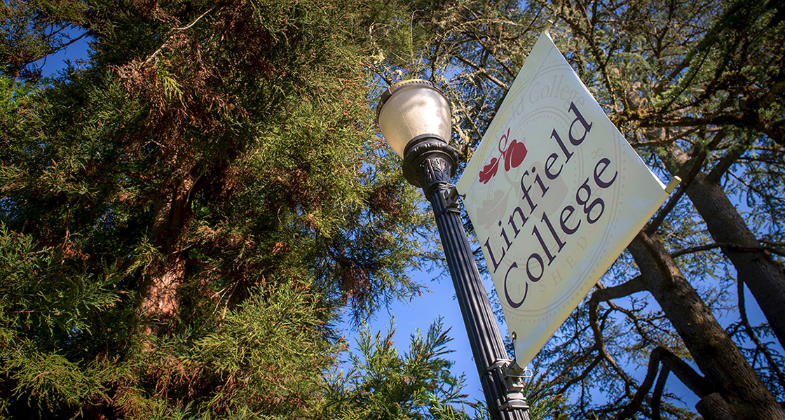 Campus banner with trees