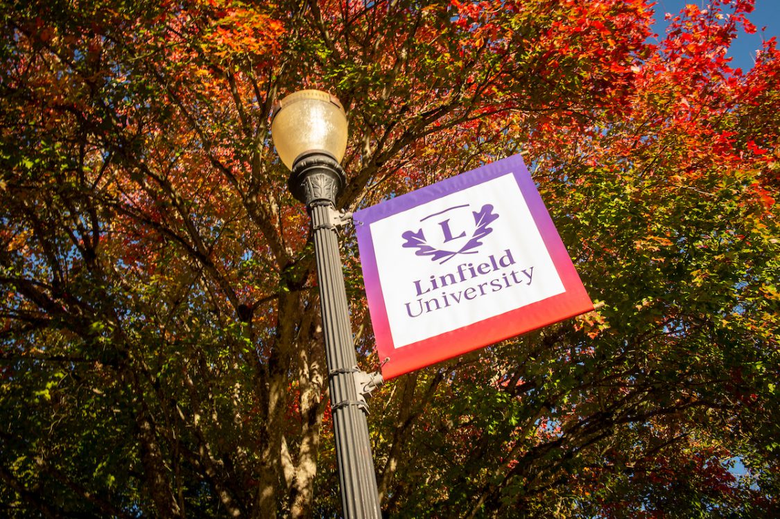 Linfield University banner on campus