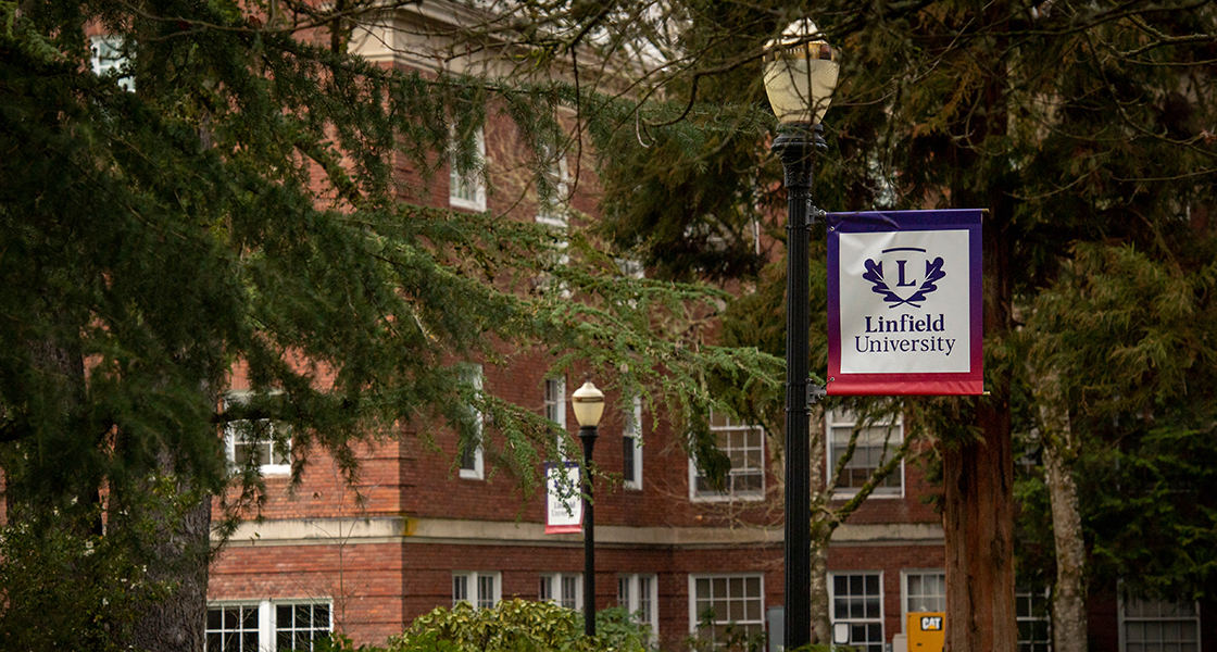 Linfield University banner on campus