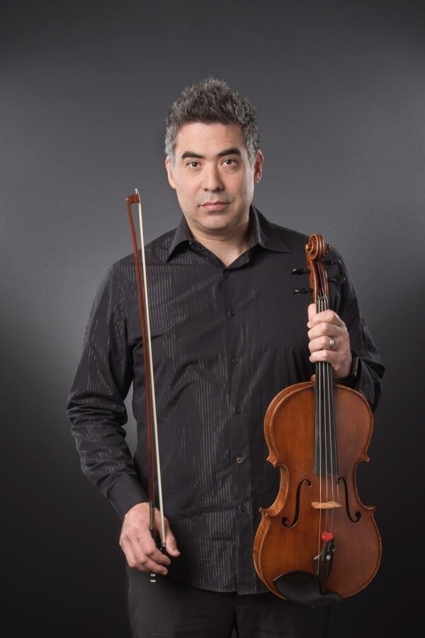 Kenji Bunch posed with viola