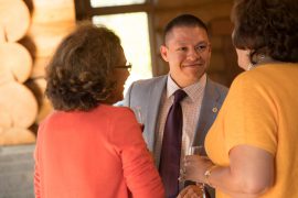Gerardo Ochoa talks to families at LatinX event