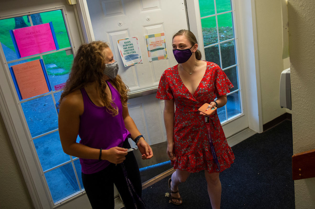 students wear masks in dorm
