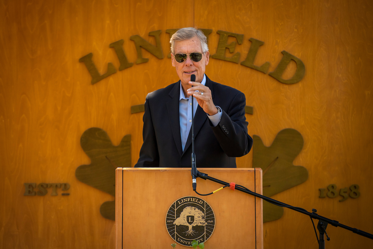 Kerry Carmody talks at a podium