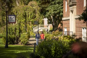 Two students walk on the McMinnville campus