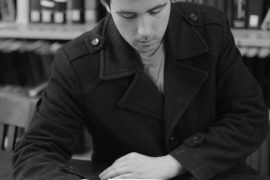 Zach Gulaboff Davis reading a book