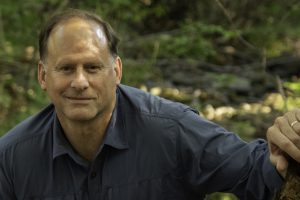 Todd Davis stands outside