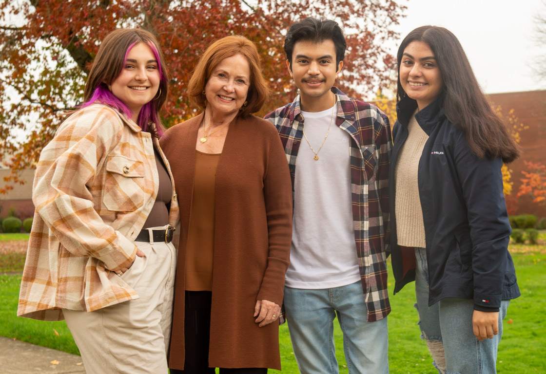 Linfield University's Domaine Serene scholars Emma Libby, Adrian Garcia and Laura (Citlalli) Cruz Reyes with Grace Evanstad, owner of Domaine Serene Winery.