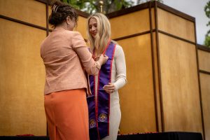 Student receives pin at May 2022 pinning ceremony
