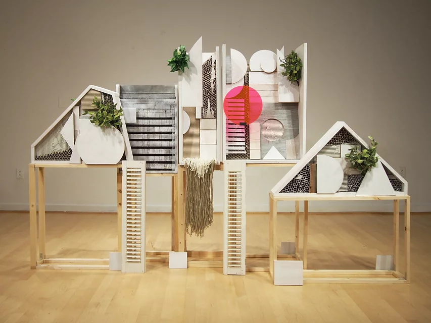 installation of Hoffecker Mejia's featuring wood, steel, yarn and found items