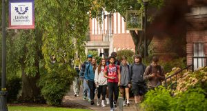 Students walking through the academic quad between classes on Linfield's McMinnville campus