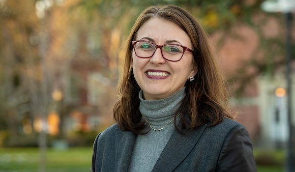 Amy Prosenjak stands on Linfield's campus.
