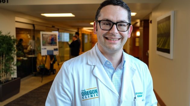 Neurosurgeon Seth Oliveria in scrubs