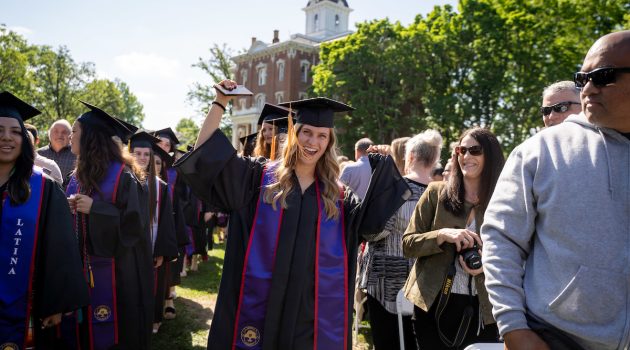 Student enters Oak Grove at Commencement 2023