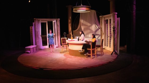 Students perform on stage at Marshall Theatre