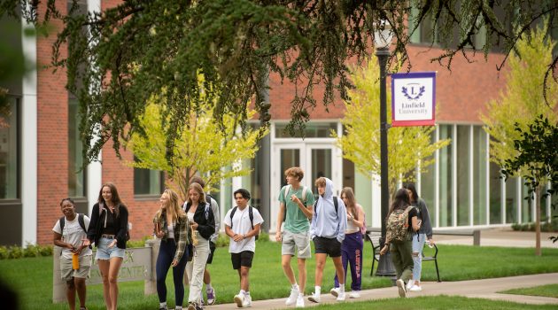 Students walk in front of the new science complex on the first day of classes