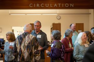 People mingle in Nicholson Library
