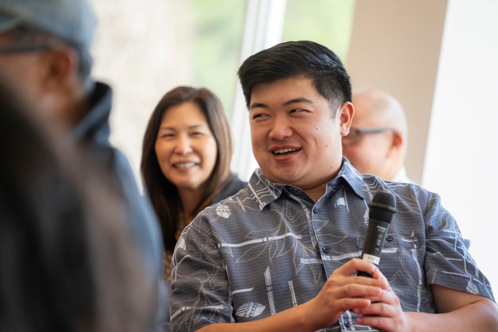 A student smiles during Linfield University’s Asian American-Pacific Islander celebration.