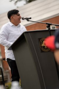 Iván Galicia Sixto addresses the crowd during the Linfield University Latine Dinner.