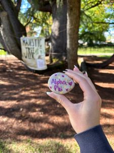 Linfield University Majestic Tree Week Alpha Phi rock endorsement.
