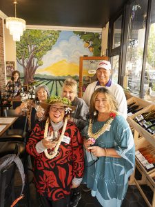 A group of Linfield alums pose for a group photo during Linfield Homecoming 2024