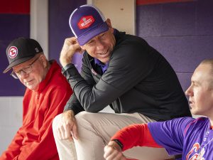 Linfield baseball coach talking to players during Linfield Homecoming 2024