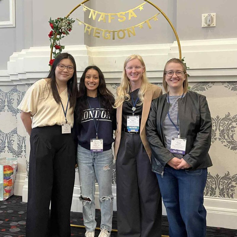 Taila Patterson, Zharyck Lopez, Megan Moonfall and Isabella Dixon ’25 at the NAFSA Region I Conference