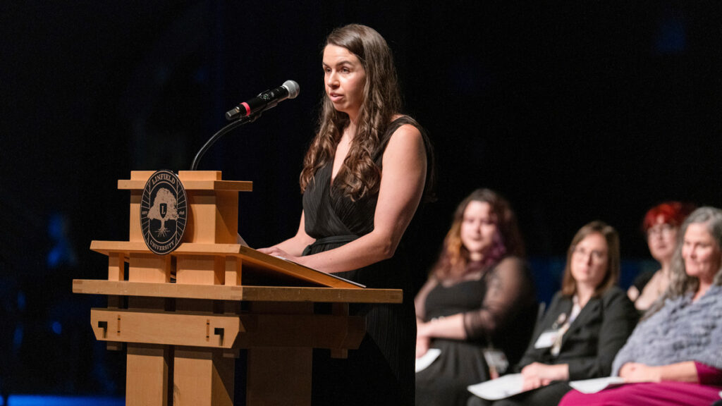 Katie Peters speaks at December Pinning Ceremony