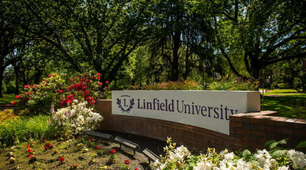 Linfield entrance sign in the spring.
