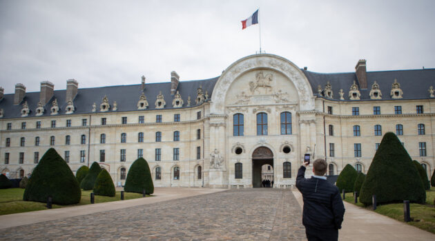 A Linfield student takes a picture of the Hôtel des Invalides in Paris
