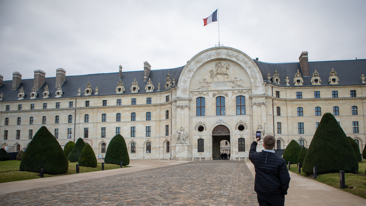 A Linfield student takes a picture of the Hôtel des Invalides in Paris