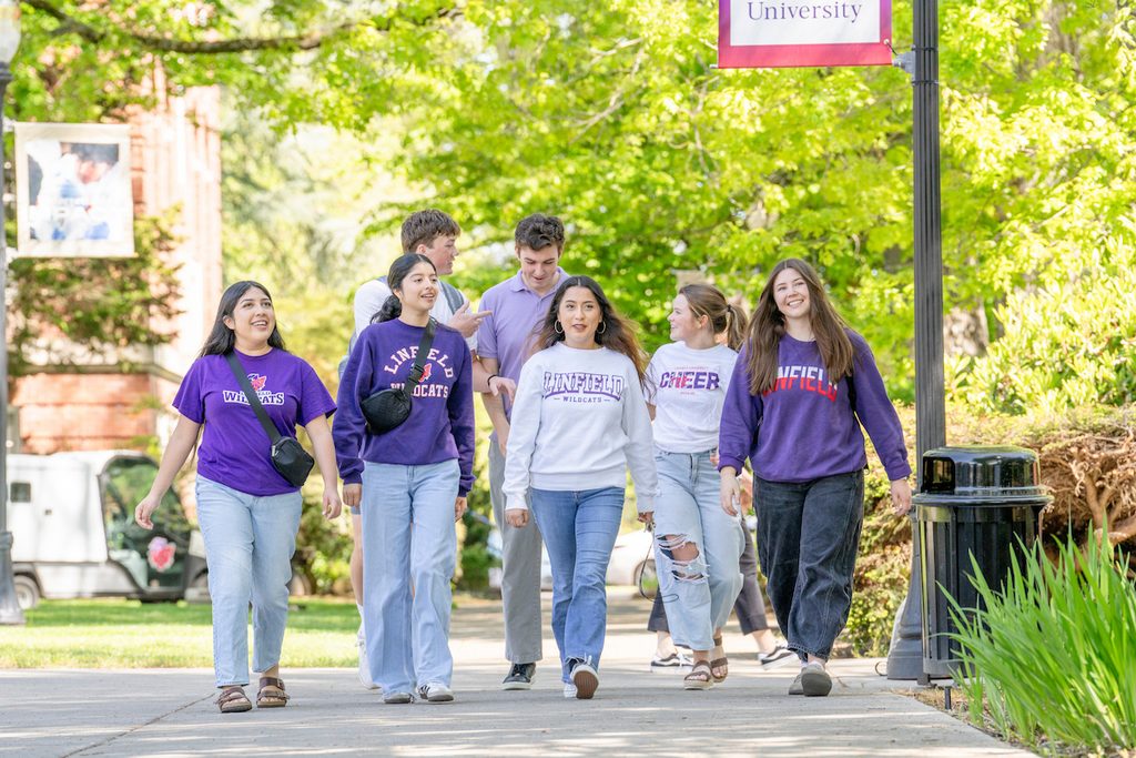 Linfield University students walk together at the McMinnville campus.