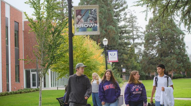 Students walk across the McMinnville campus.